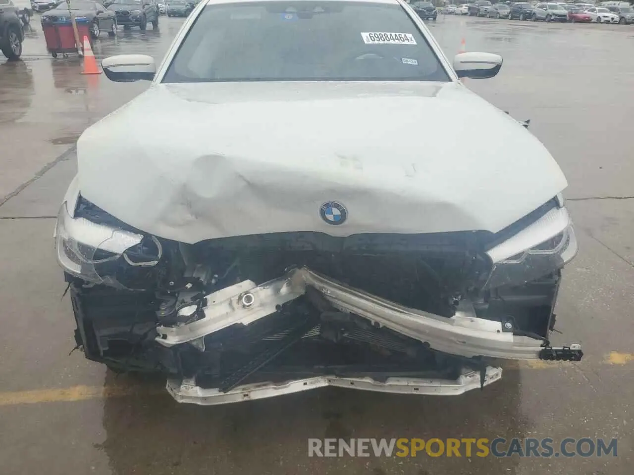 11 Photograph of a damaged car WBAJR3C09LCD79980 BMW 5 SERIES 2020