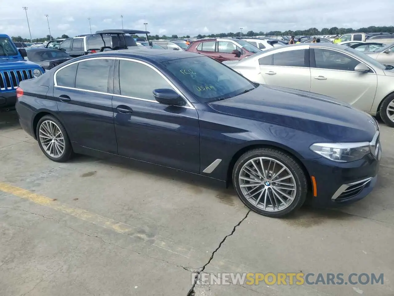 4 Photograph of a damaged car WBAJR3C0XLWW76929 BMW 5 SERIES 2020