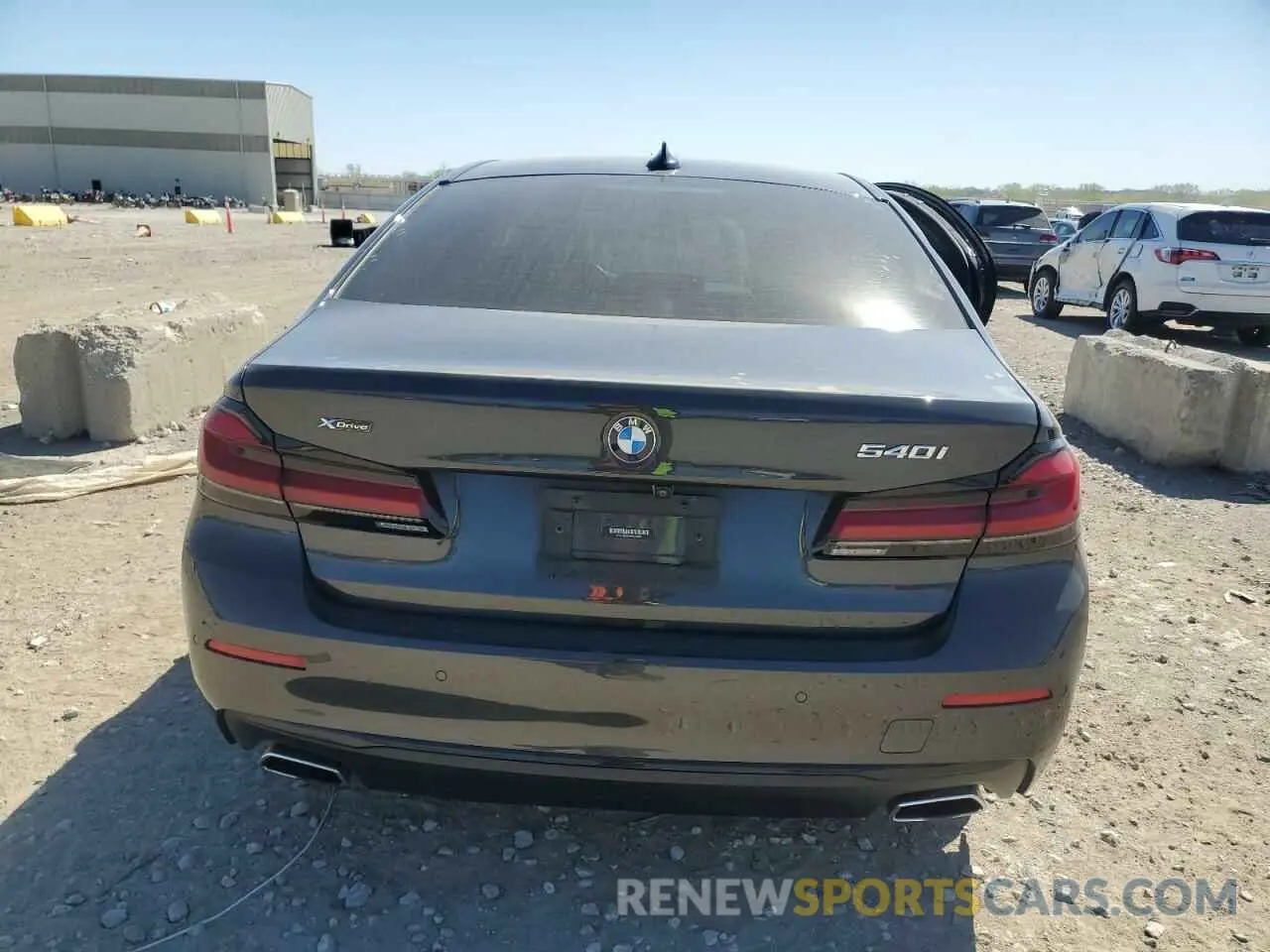 6 Photograph of a damaged car WBA73BJ0XMWW98052 BMW 5 SERIES 2021