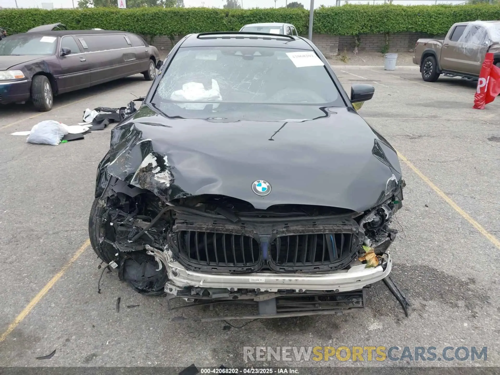 12 Photograph of a damaged car WBAJA9C56KB399028 BMW 530E 2019