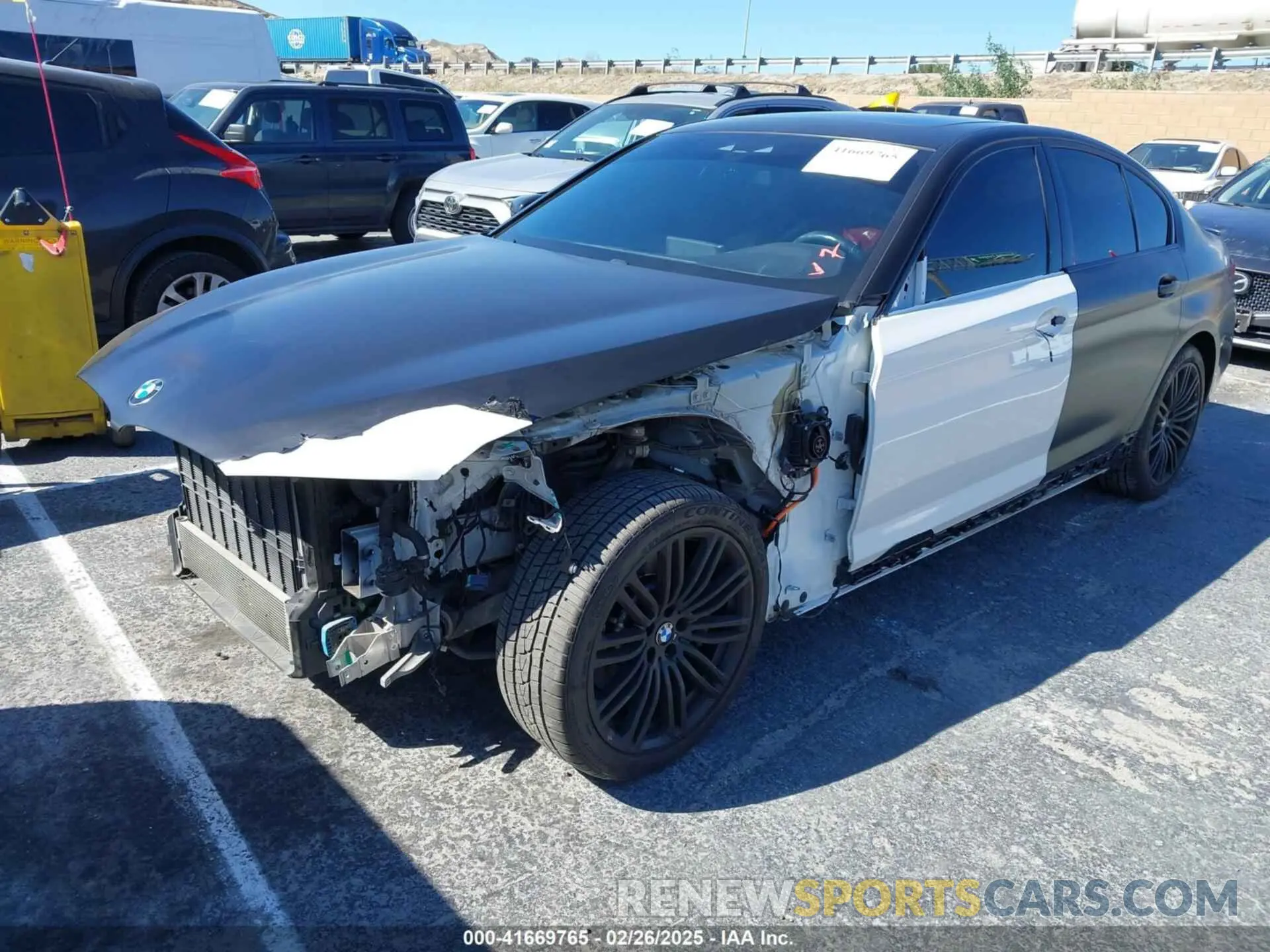 2 Photograph of a damaged car WBAJA9C02LCD31800 BMW 530E 2020
