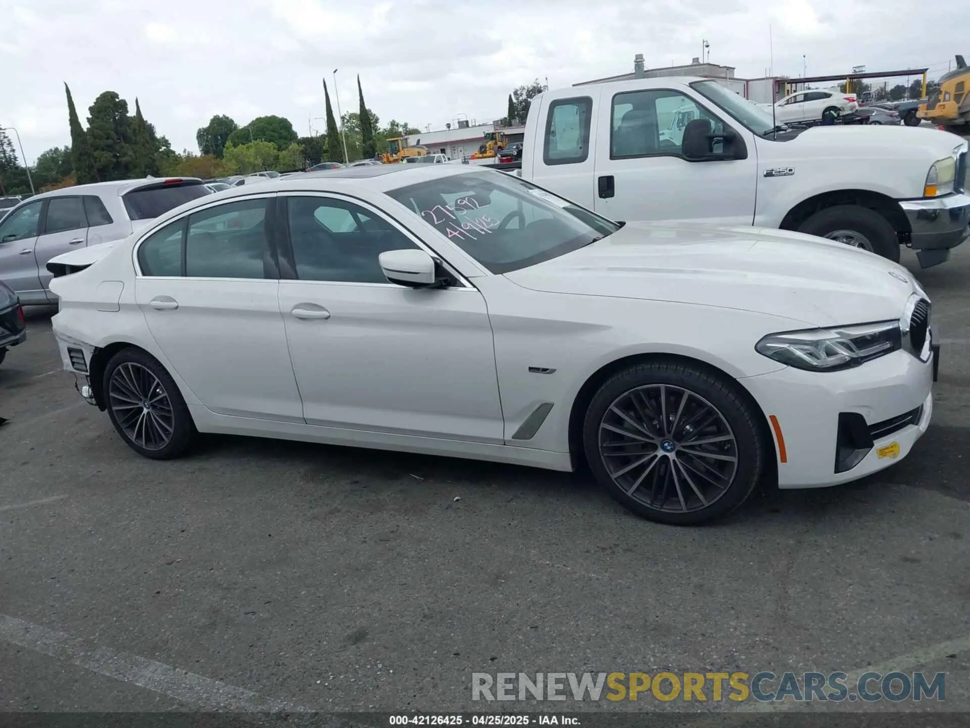 14 Photograph of a damaged car WBA13AG07NCJ53016 BMW 530E 2022