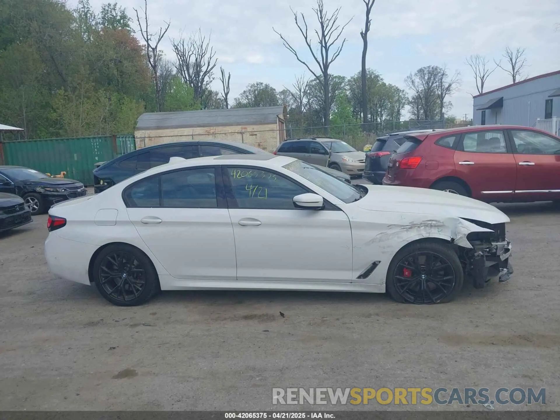 13 Photograph of a damaged car WBA73BJ07PWX98985 BMW 540 2023