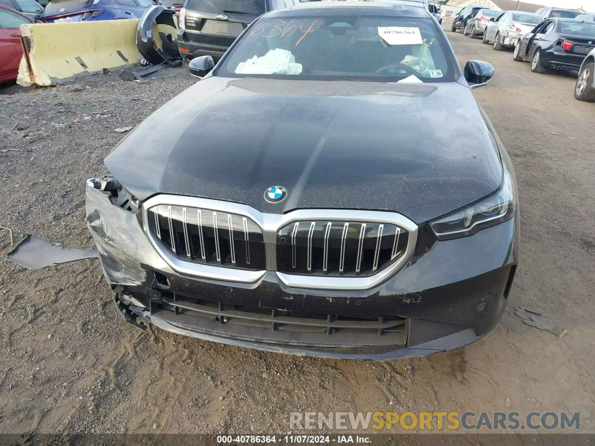 11 Photograph of a damaged car WBA63FJ08RCS79869 BMW 540 2024
