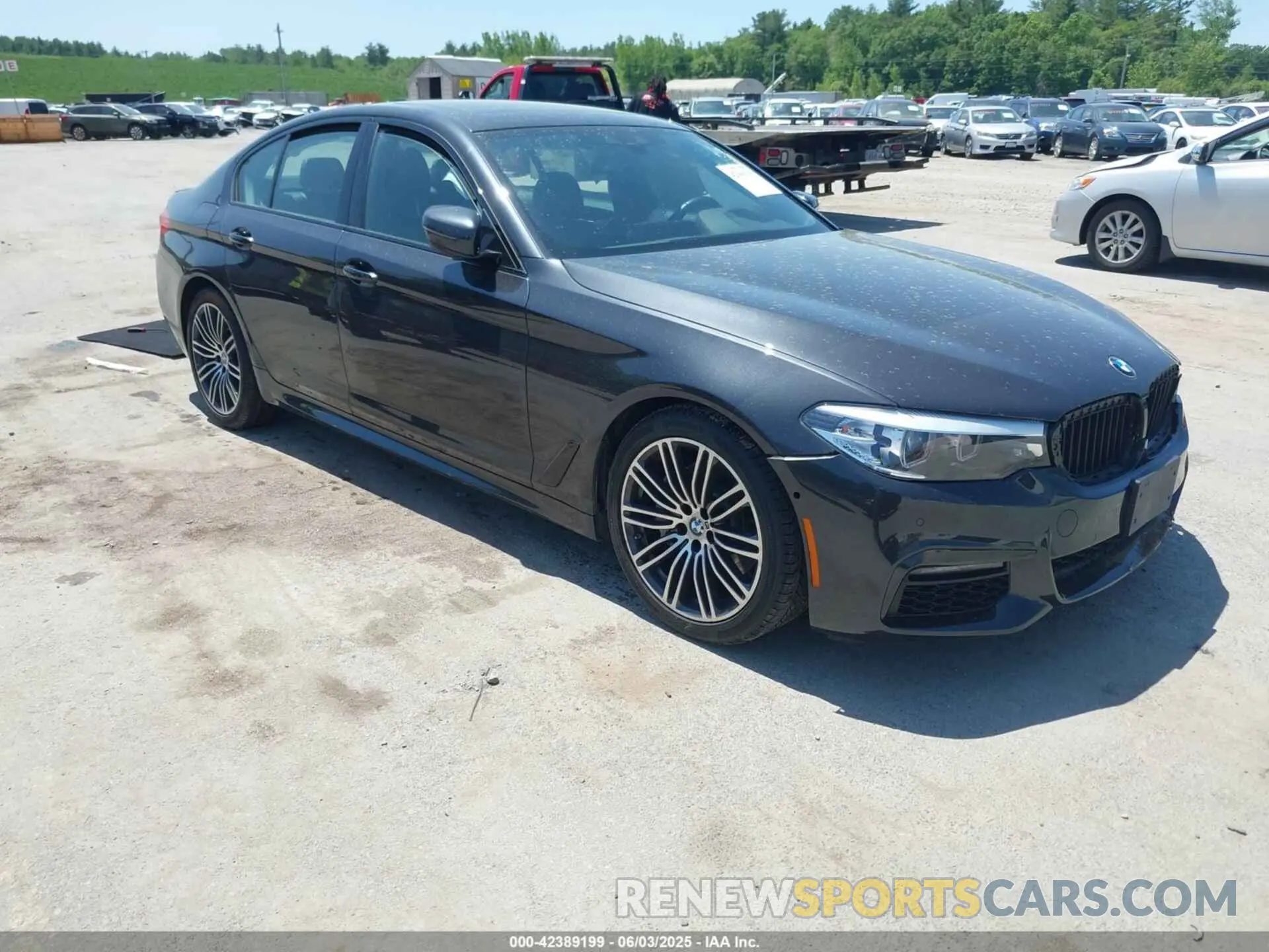 1 Photograph of a damaged car WBAJE7C59KWW18453 BMW 540I 2019