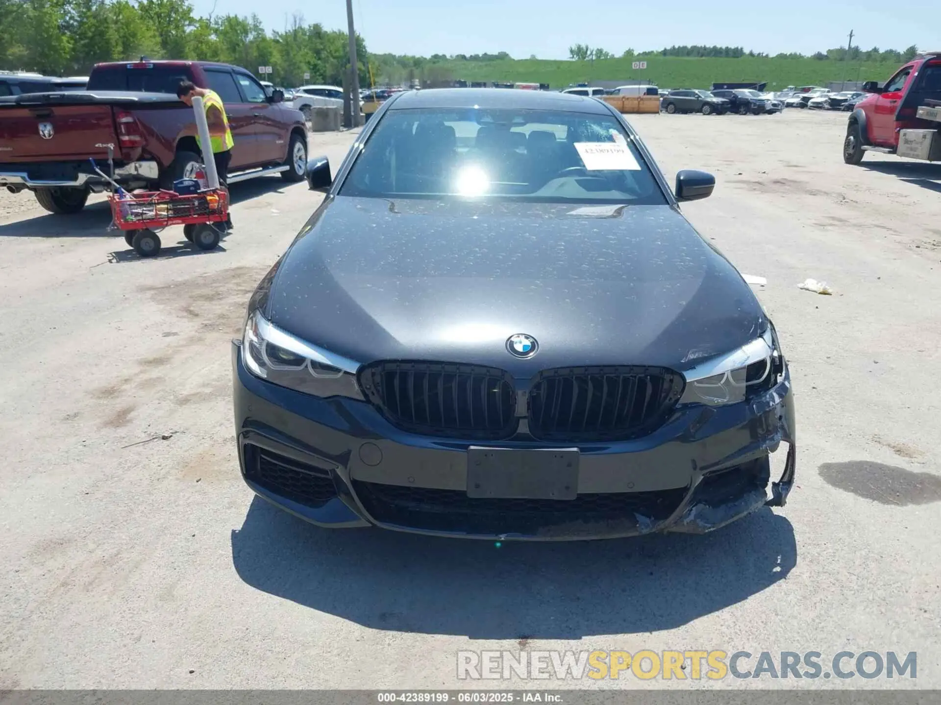 12 Photograph of a damaged car WBAJE7C59KWW18453 BMW 540I 2019