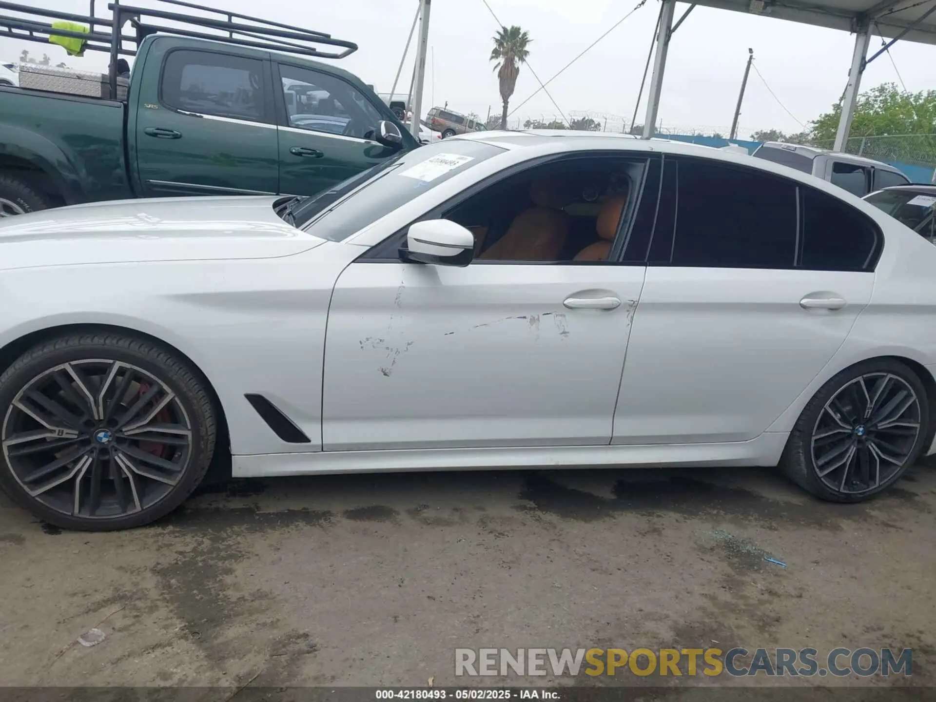 14 Photograph of a damaged car WBA53BJ00MWW90243 BMW 540I 2021