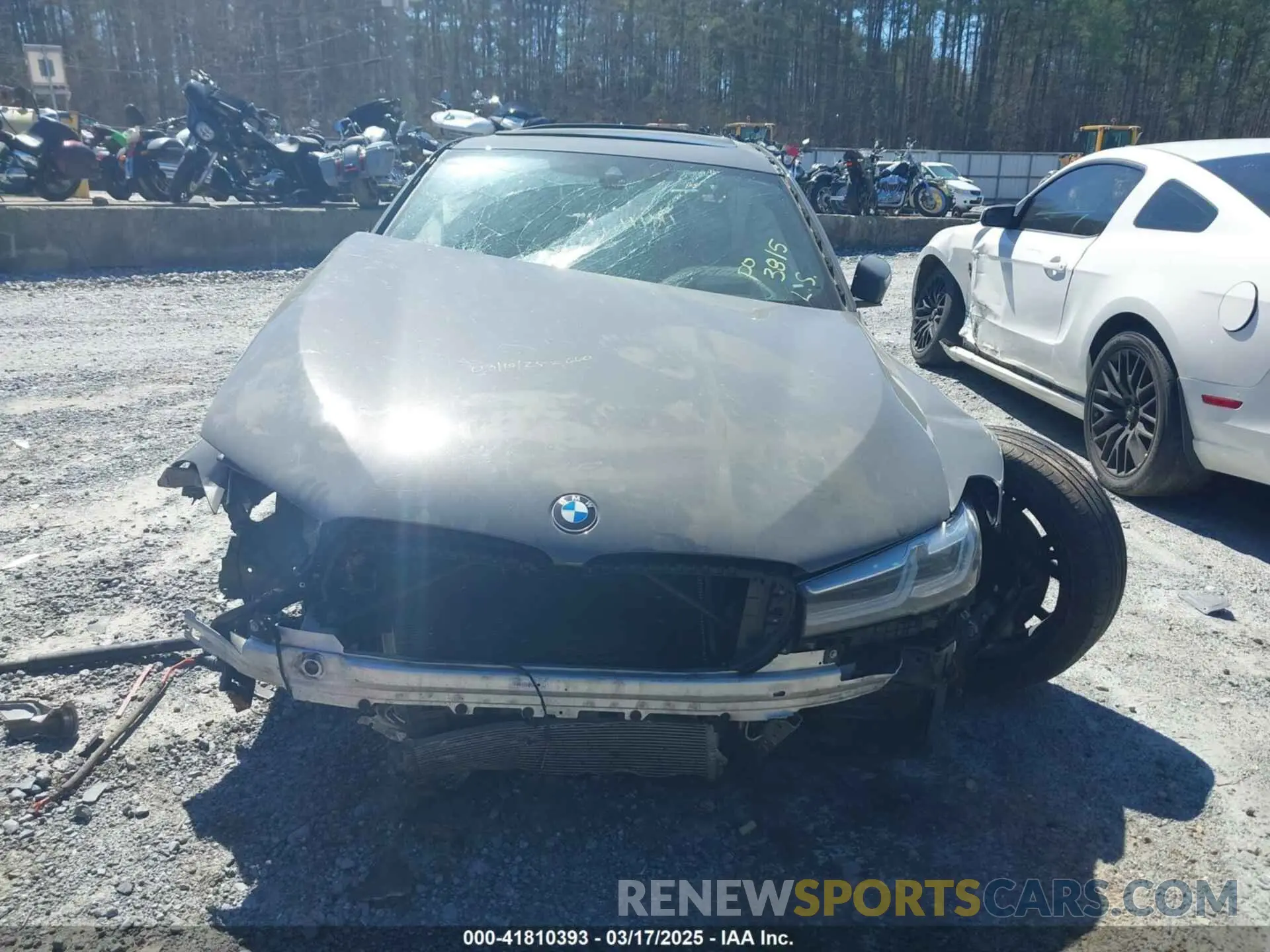 11 Photograph of a damaged car WBA73BJ09MCG10189 BMW 540I 2021