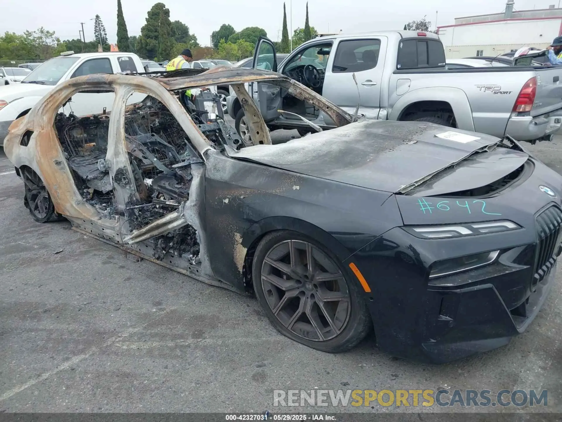 1 Photograph of a damaged car WBA33EH0XRCS31602 BMW 740 2024