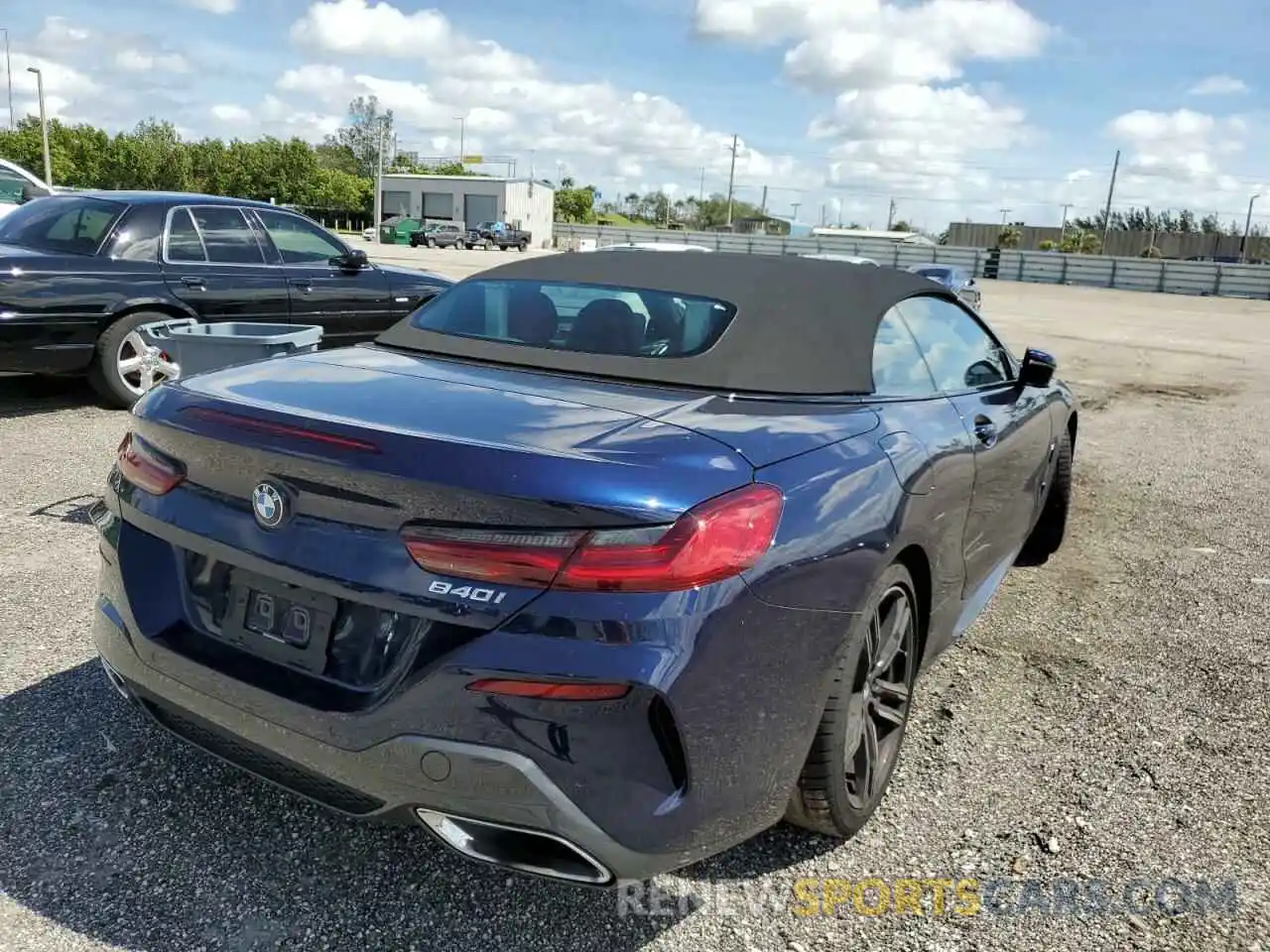 4 Photograph of a damaged car WBADZ2C04NCJ26346 BMW 8 SERIES 2022