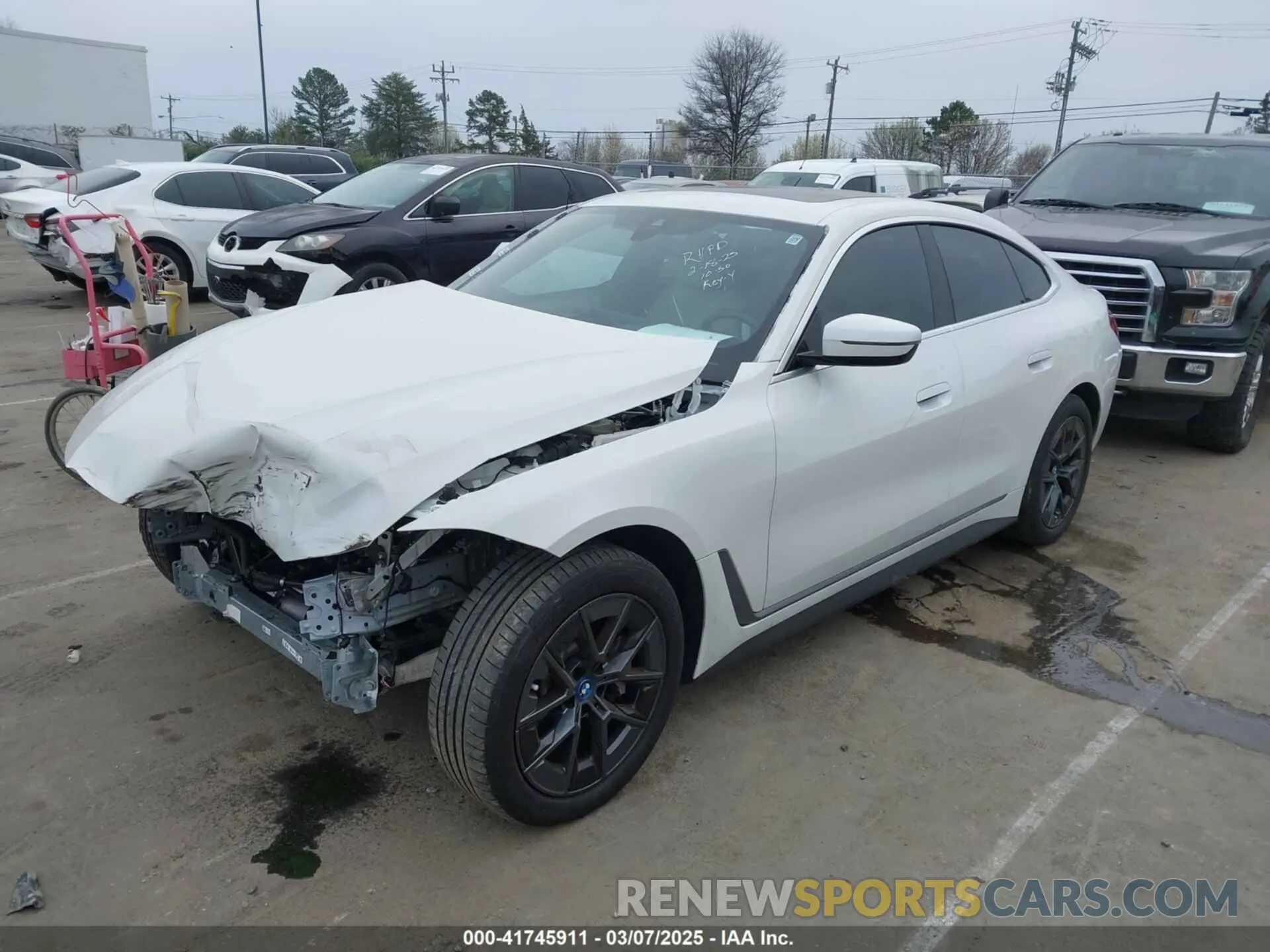 2 Photograph of a damaged car WBY43AW04PFP70309 BMW I4 2023