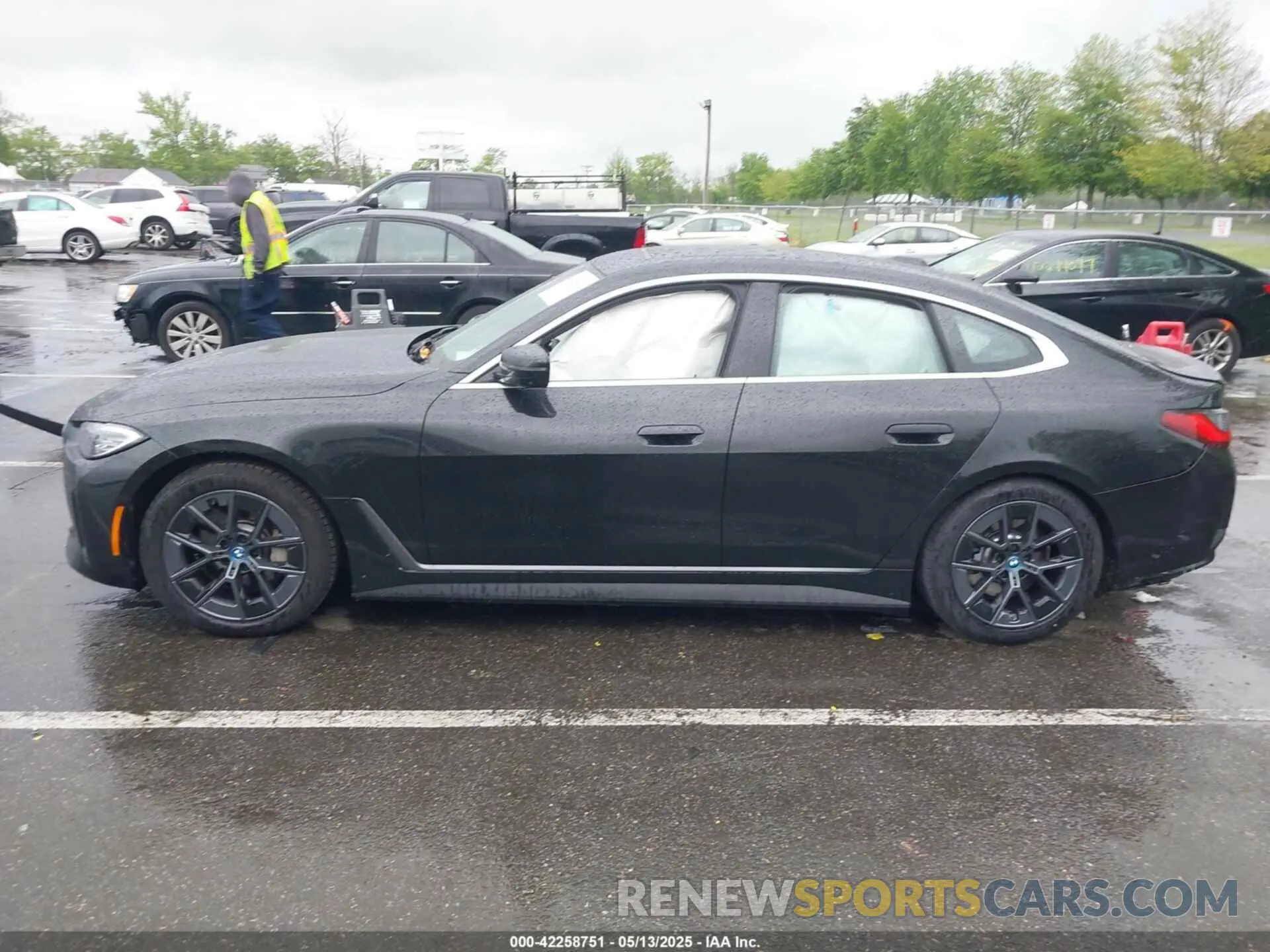 14 Photograph of a damaged car WBY83FB07RFT10939 BMW I4 2024