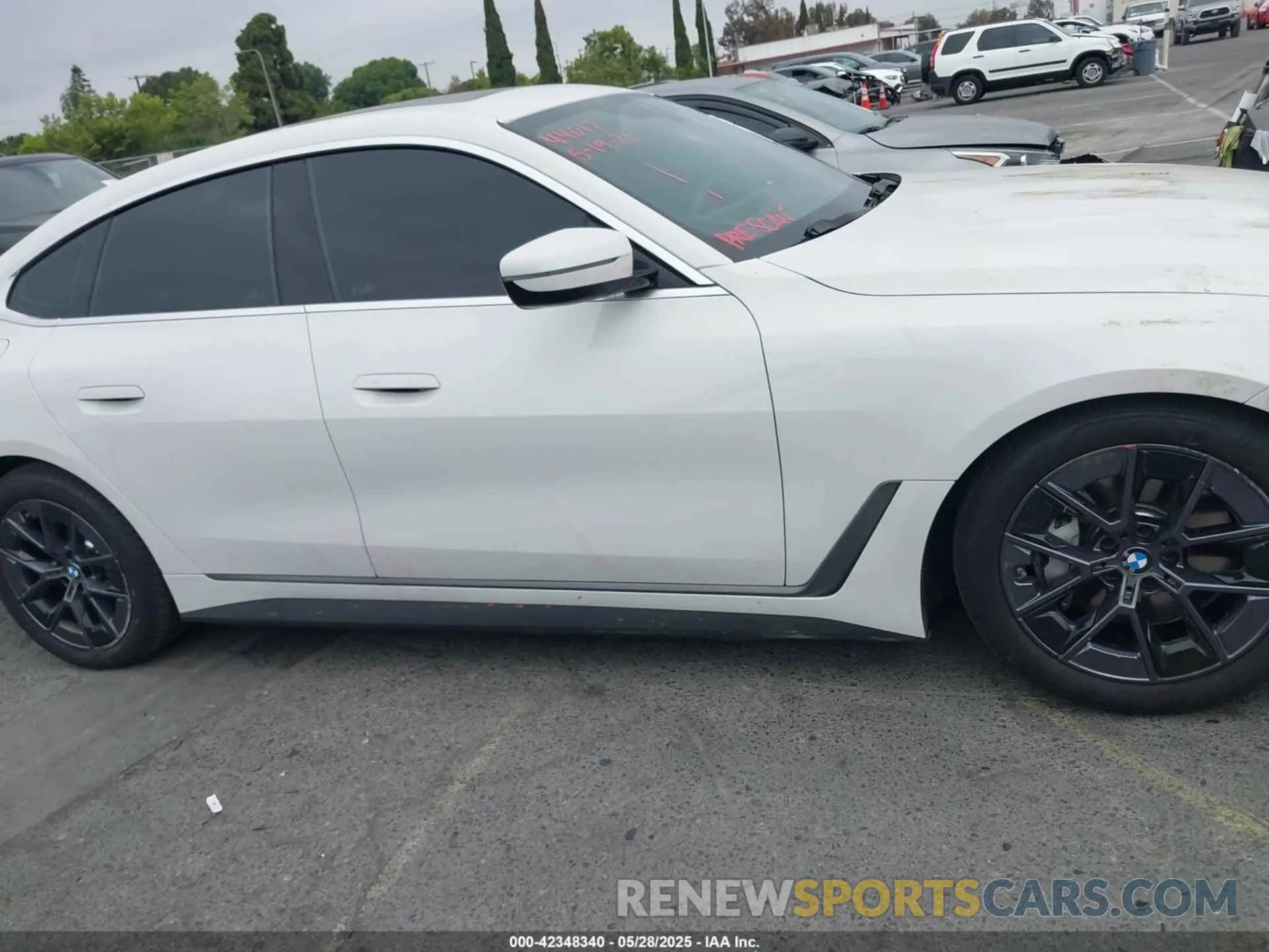 13 Photograph of a damaged car WBY23HD00SFU36354 BMW I4 2025