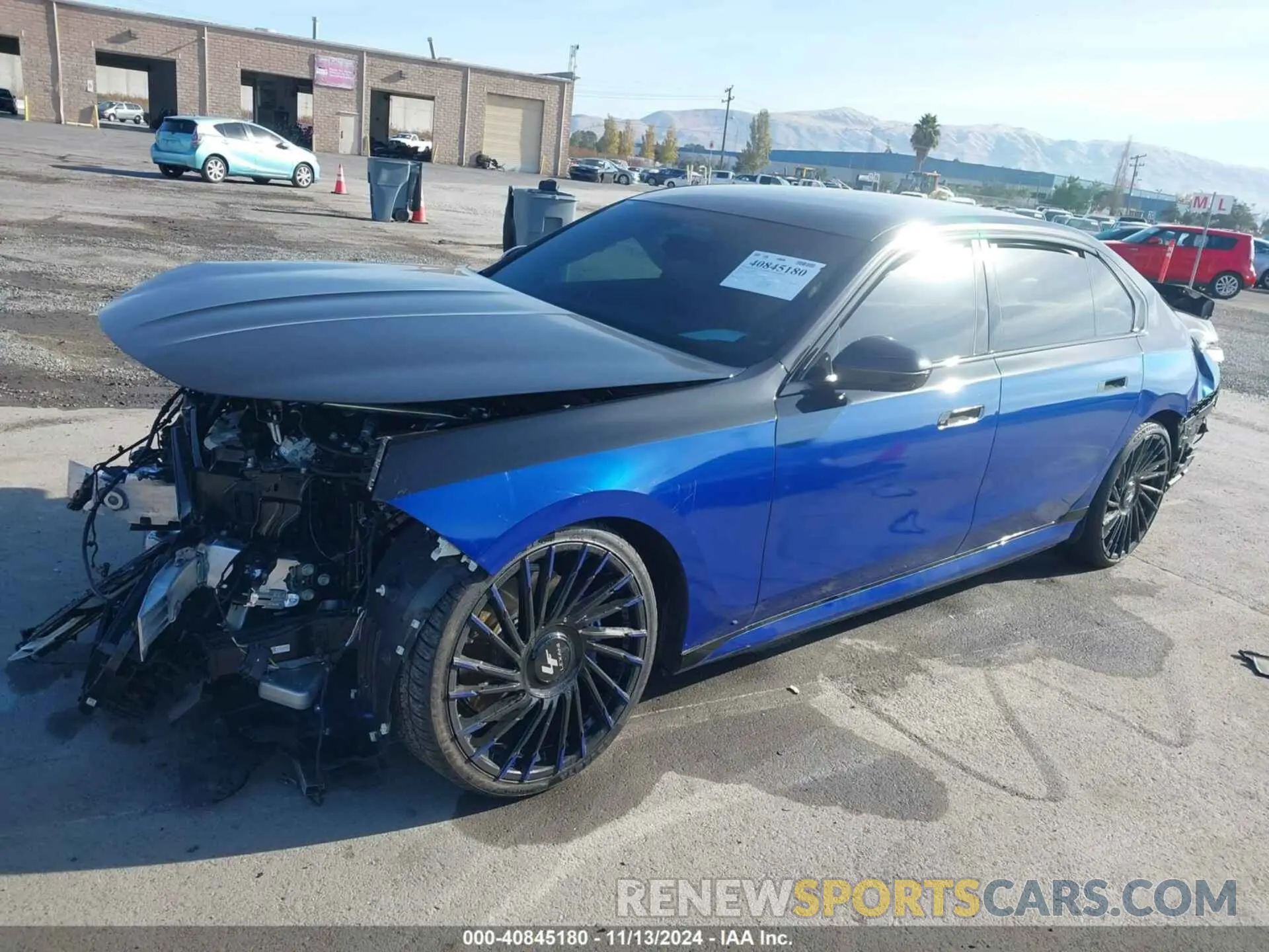 2 Photograph of a damaged car WBY53EJ05PCN86100 BMW I7 2023