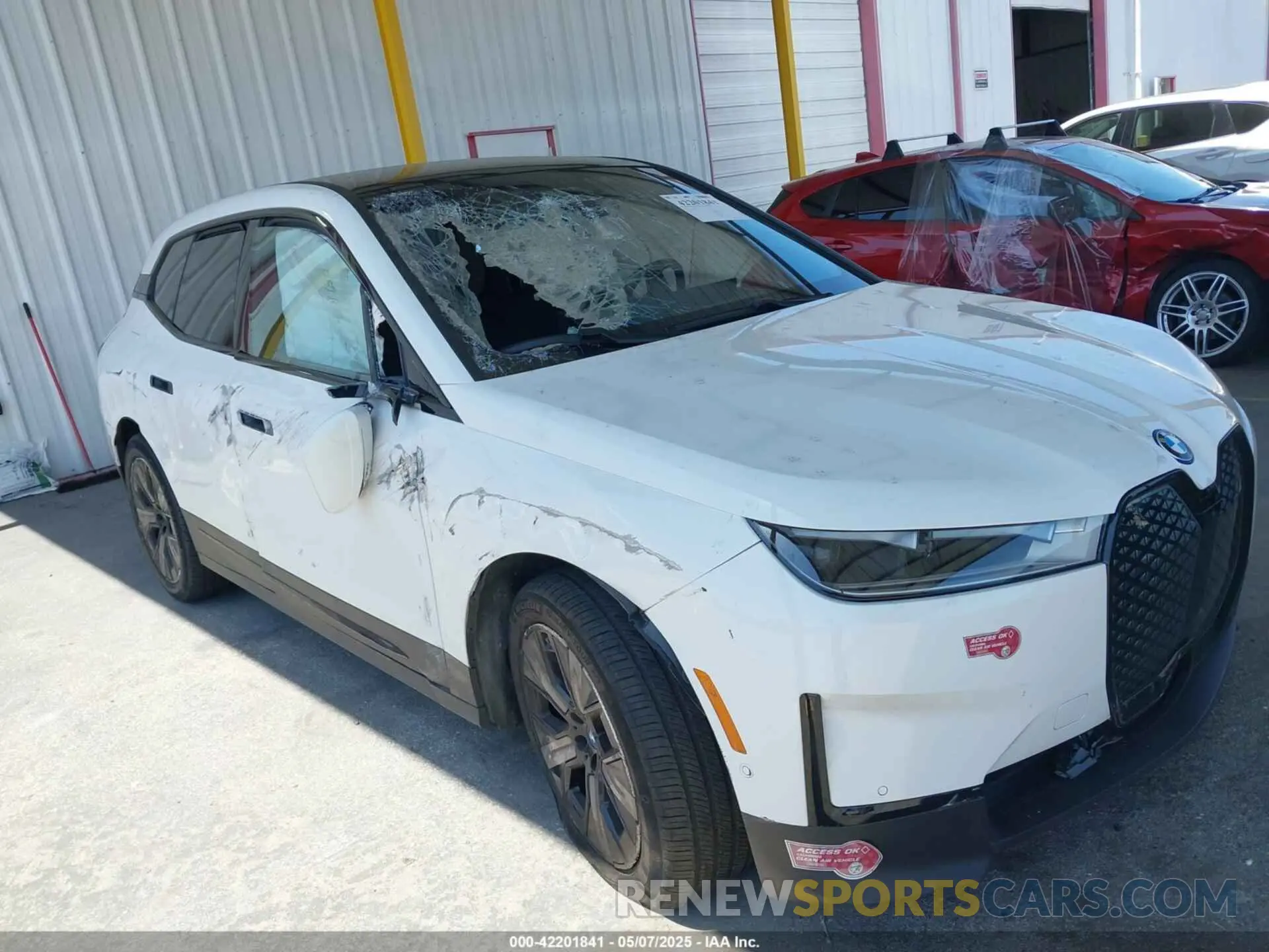 1 Photograph of a damaged car WB523CF05RCR75951 BMW IX 2024