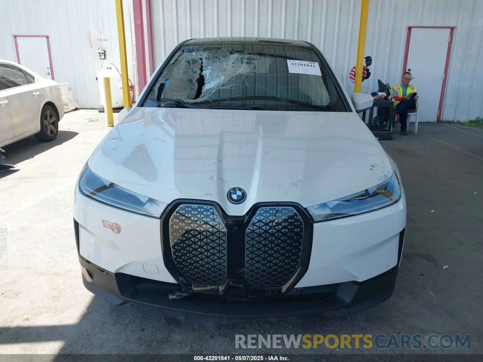 12 Photograph of a damaged car WB523CF05RCR75951 BMW IX 2024