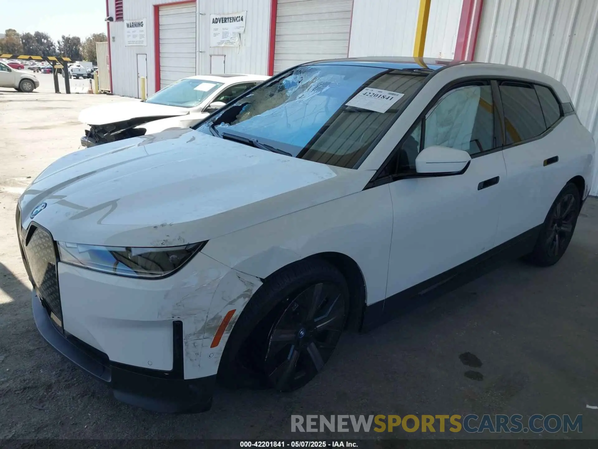 2 Photograph of a damaged car WB523CF05RCR75951 BMW IX 2024