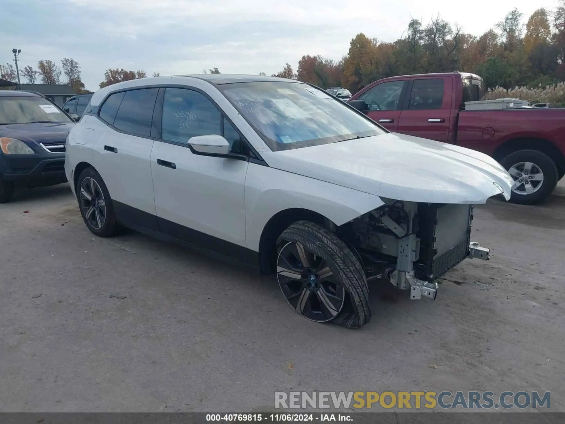 1 Photograph of a damaged car WB523CF06RCR10655 BMW IX 2024
