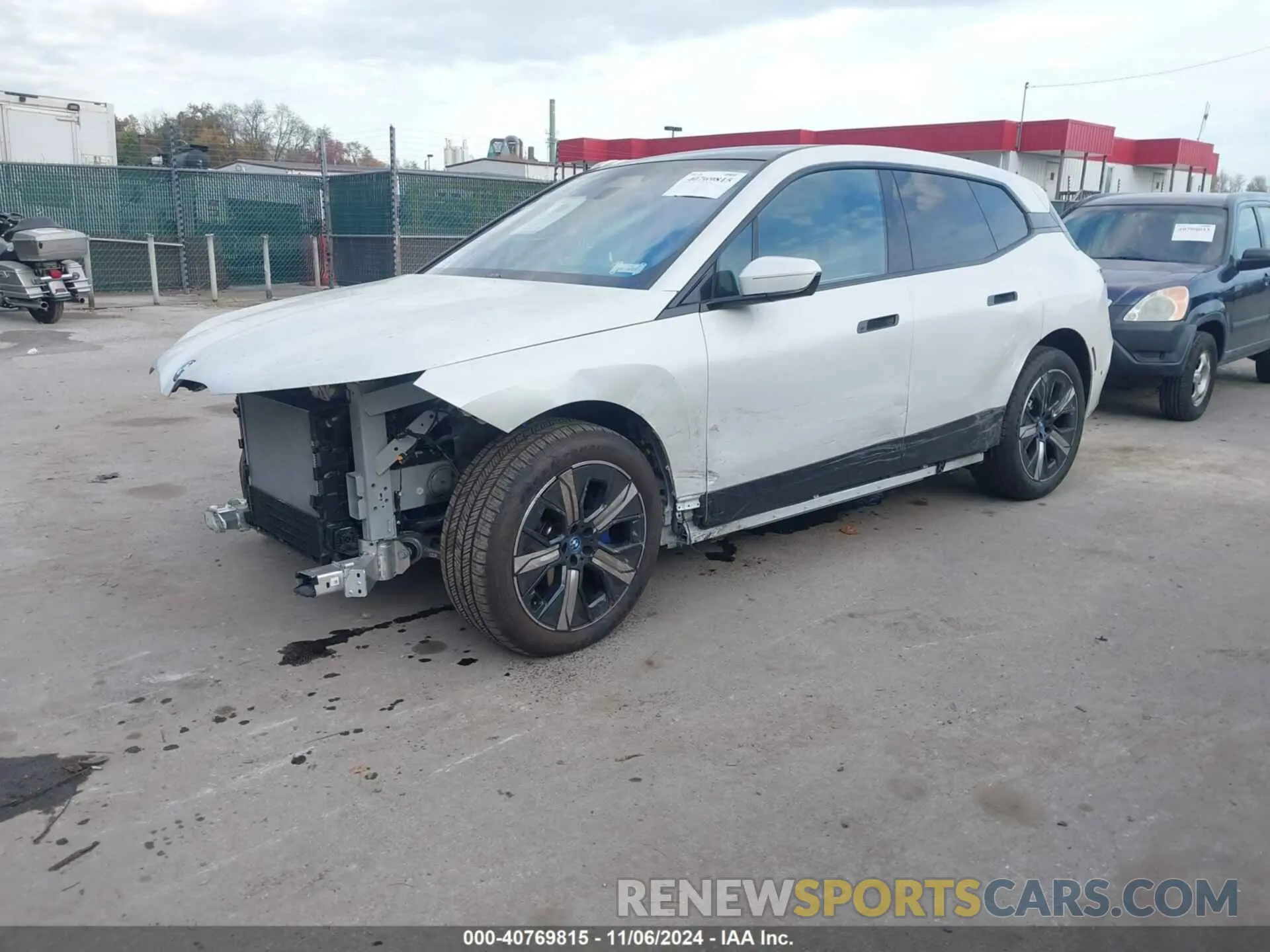 2 Photograph of a damaged car WB523CF06RCR10655 BMW IX 2024