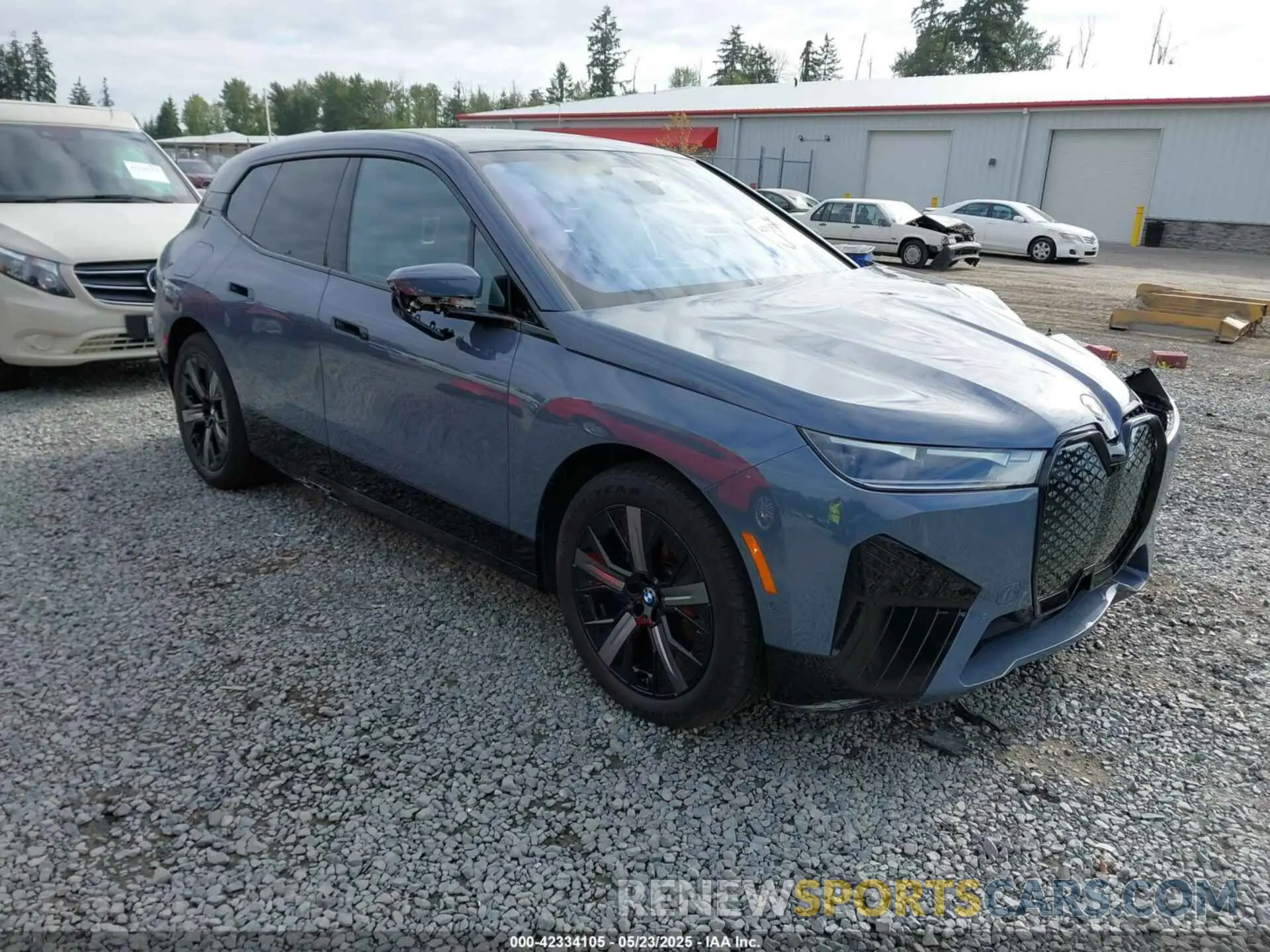 1 Photograph of a damaged car WB523CF08RCN65886 BMW IX 2024