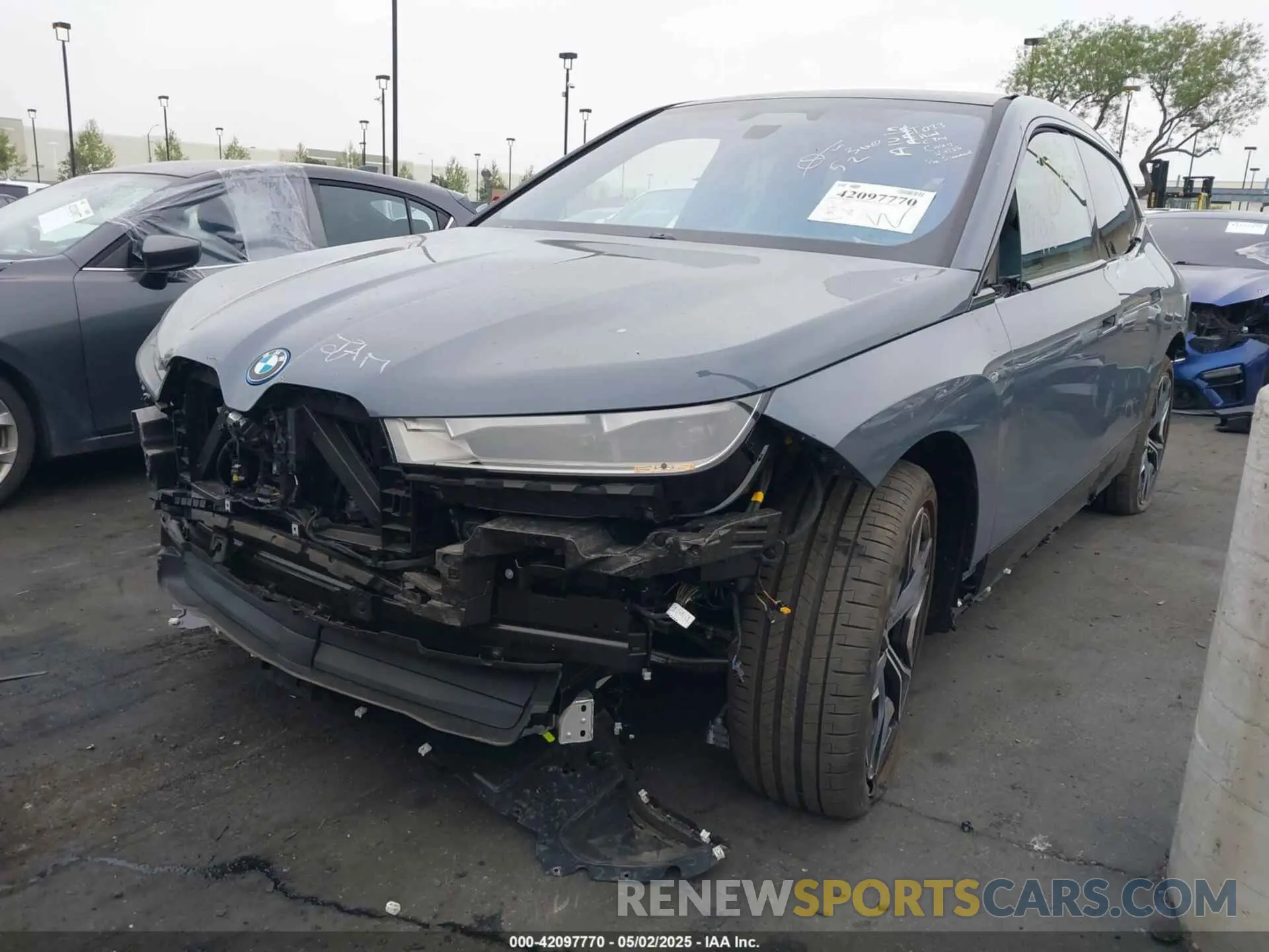 2 Photograph of a damaged car WB523CF07SCT32782 BMW IX 2025