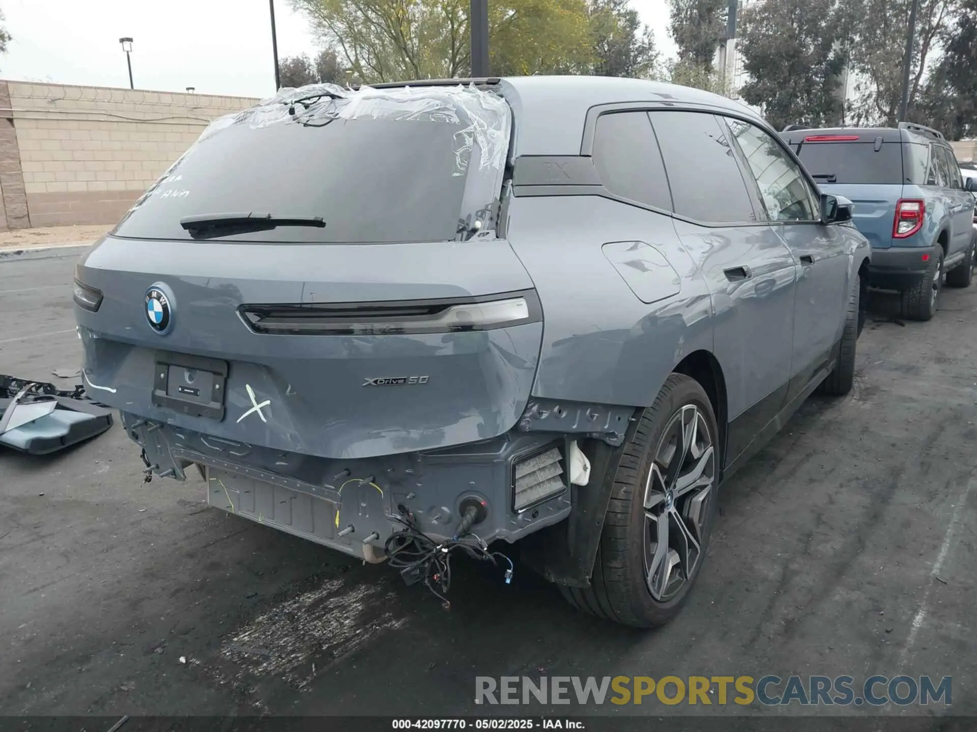4 Photograph of a damaged car WB523CF07SCT32782 BMW IX 2025