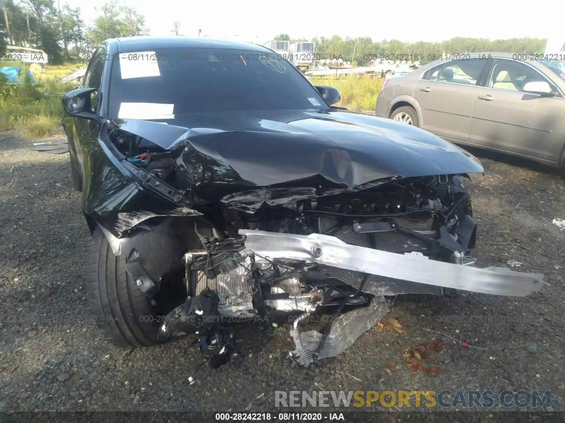 6 Photograph of a damaged car WBS2U7C00L7F04024 BMW M2 2020