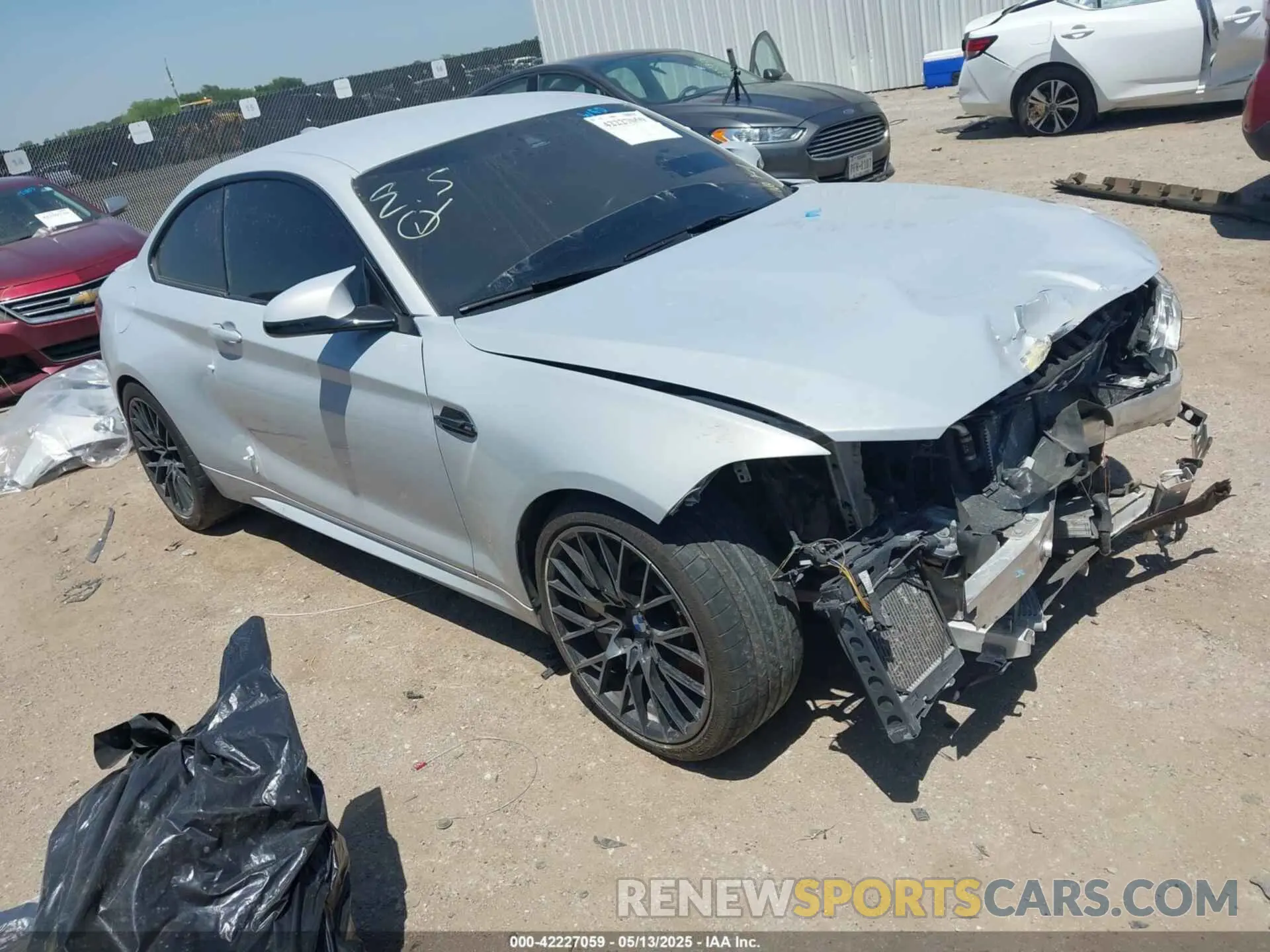 1 Photograph of a damaged car WBS2U7C02L7D97896 BMW M2 2020