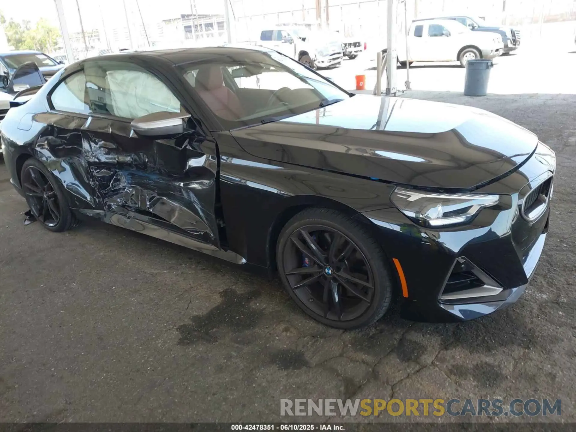 1 Photograph of a damaged car 3MW53CM02N8C51802 BMW M240 2022