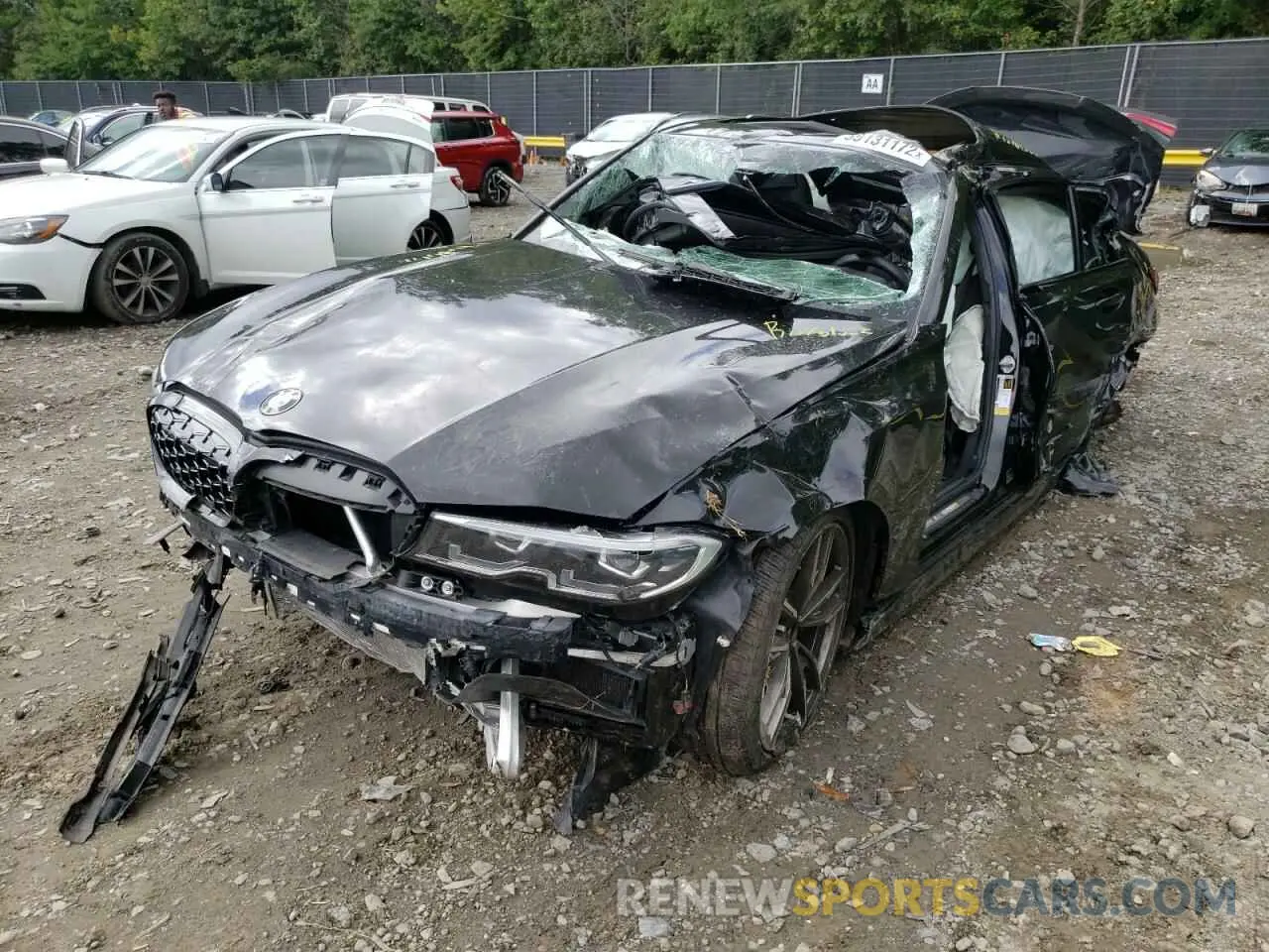 2 Photograph of a damaged car 3MW5U7J03L8B40147 BMW M3 2020