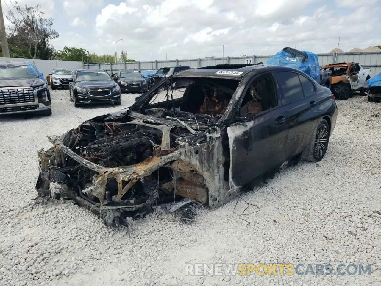 1 Photograph of a damaged car WBA5U7C05LFH07224 BMW M3 2020