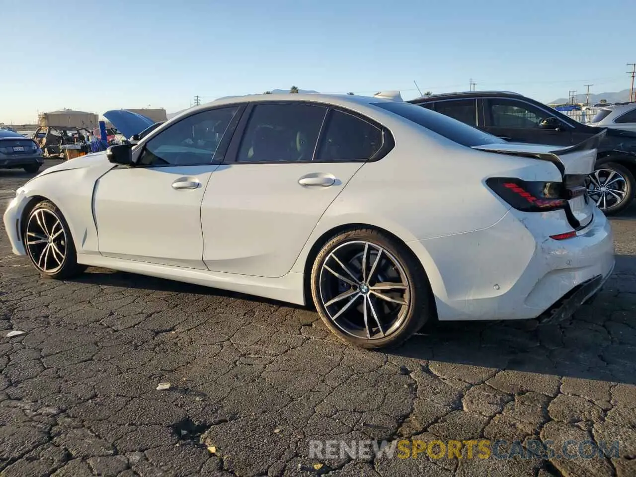 2 Photograph of a damaged car 3MW5U7J05M8B93885 BMW M3 2021