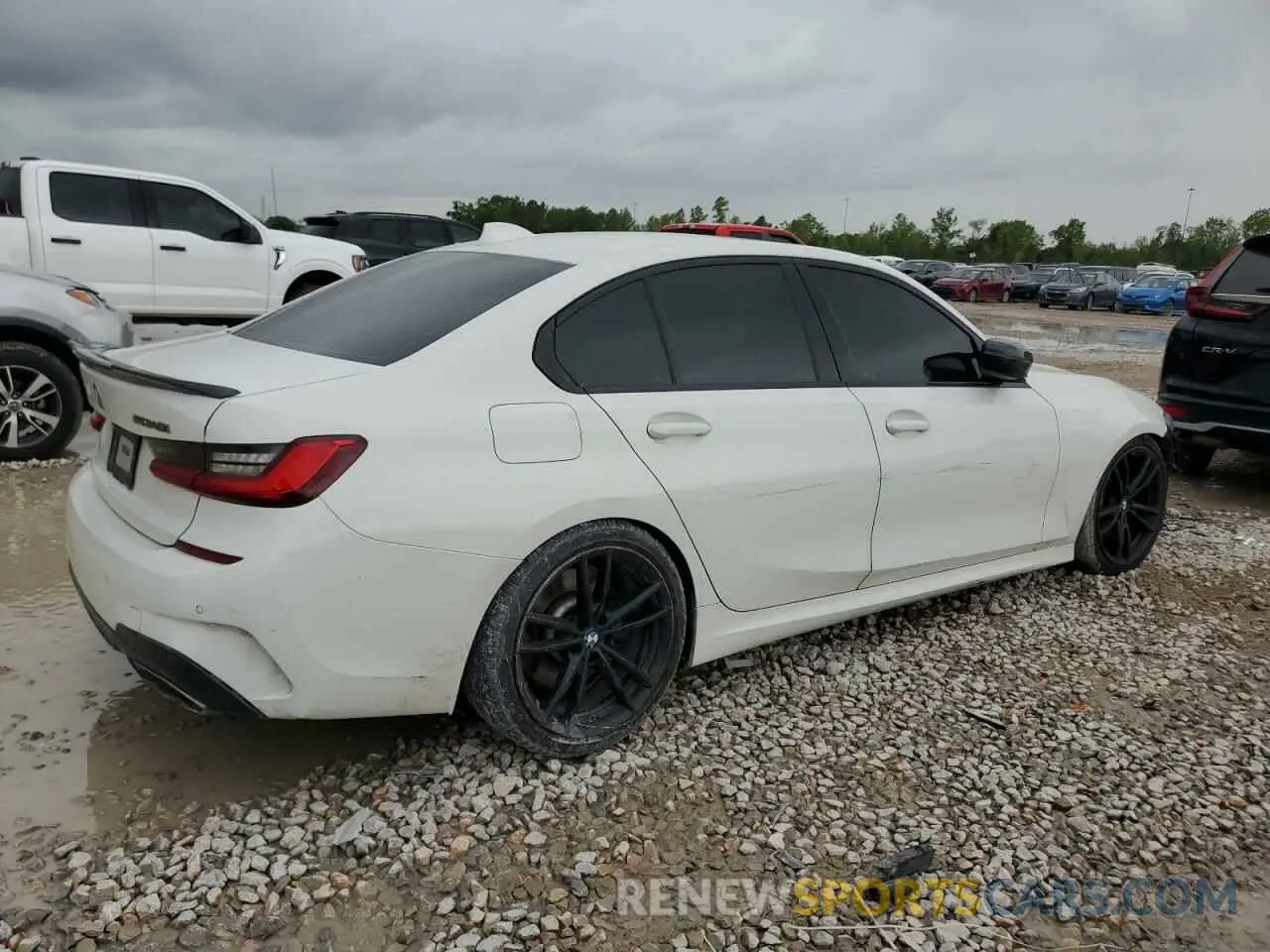 3 Photograph of a damaged car 3MW5U7J08M8C10971 BMW M3 2021