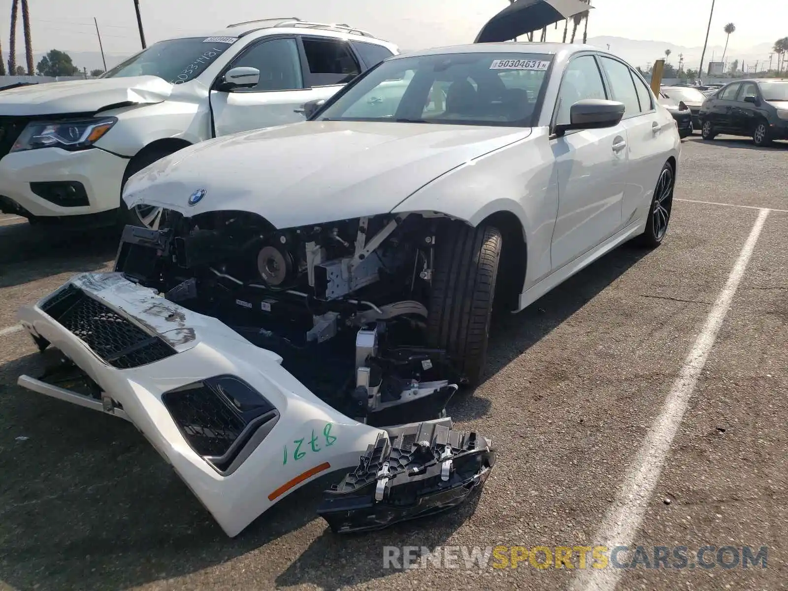 2 Photograph of a damaged car 3MW5U7J09M8B59237 BMW M3 2021