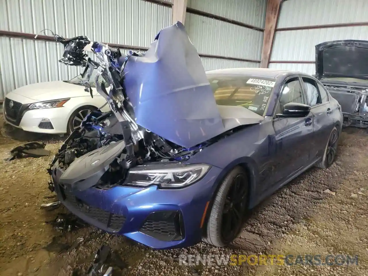 2 Photograph of a damaged car 3MW5U7J0XM8C13127 BMW M3 2021