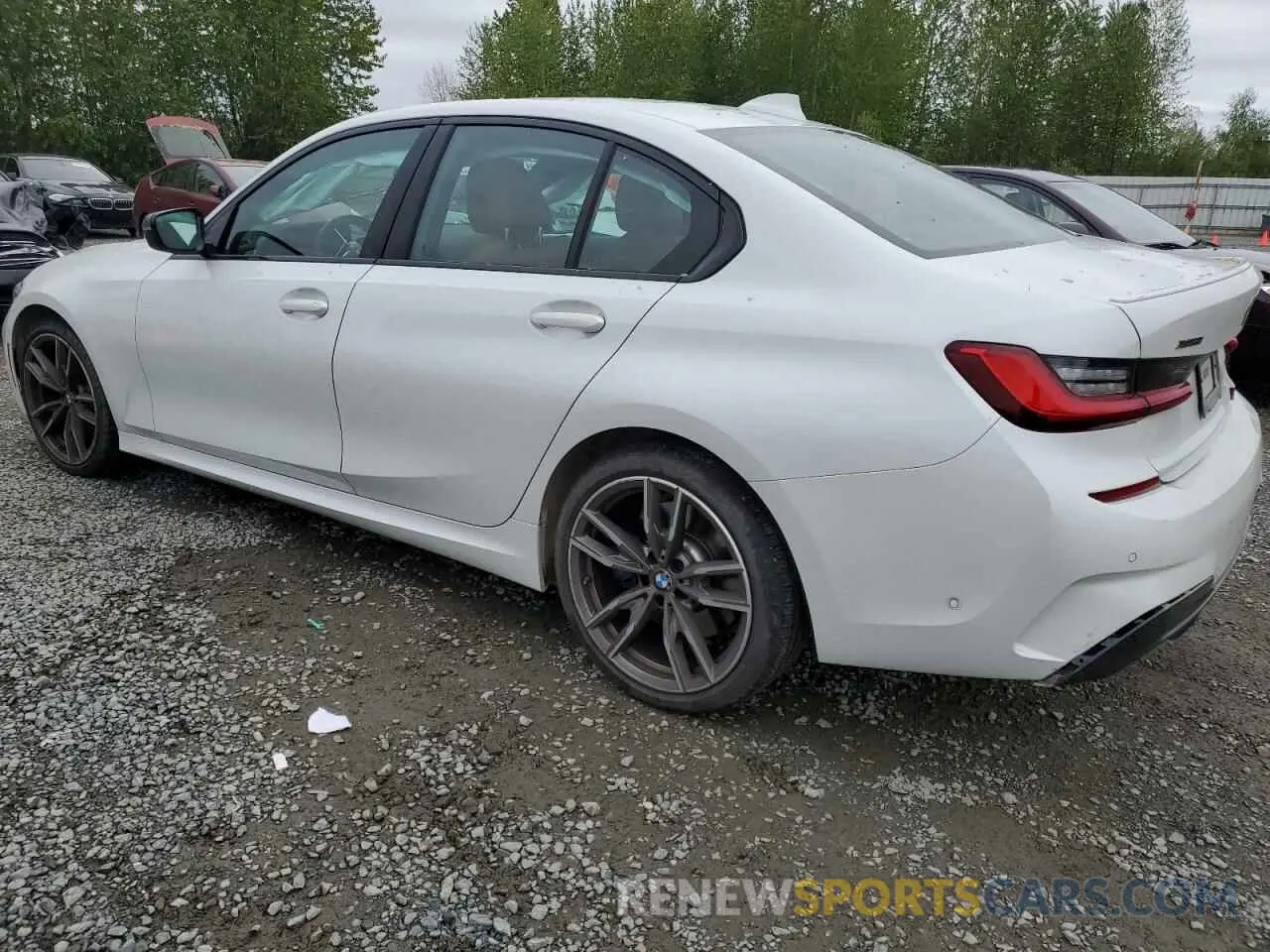 2 Photograph of a damaged car 3MW5U9J05M8B49011 BMW M3 2021