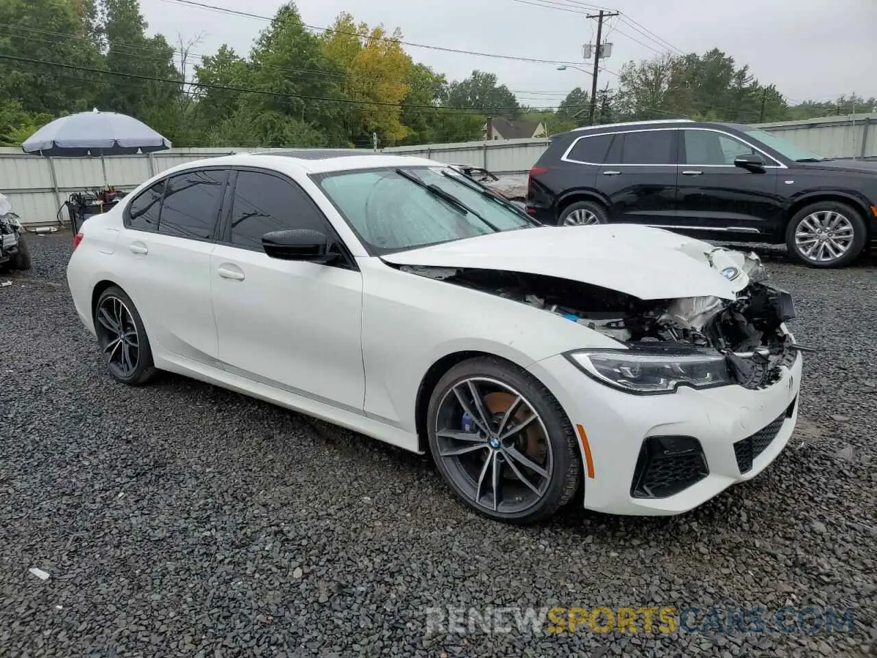4 Photograph of a damaged car 3MW5U9J05M8B57321 BMW M3 2021