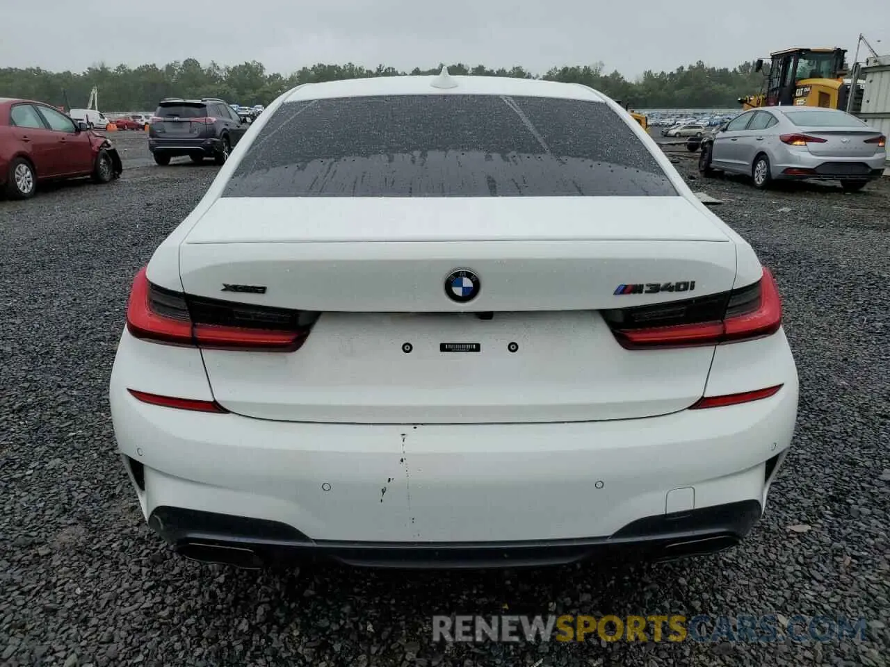 6 Photograph of a damaged car 3MW5U9J05M8B57321 BMW M3 2021
