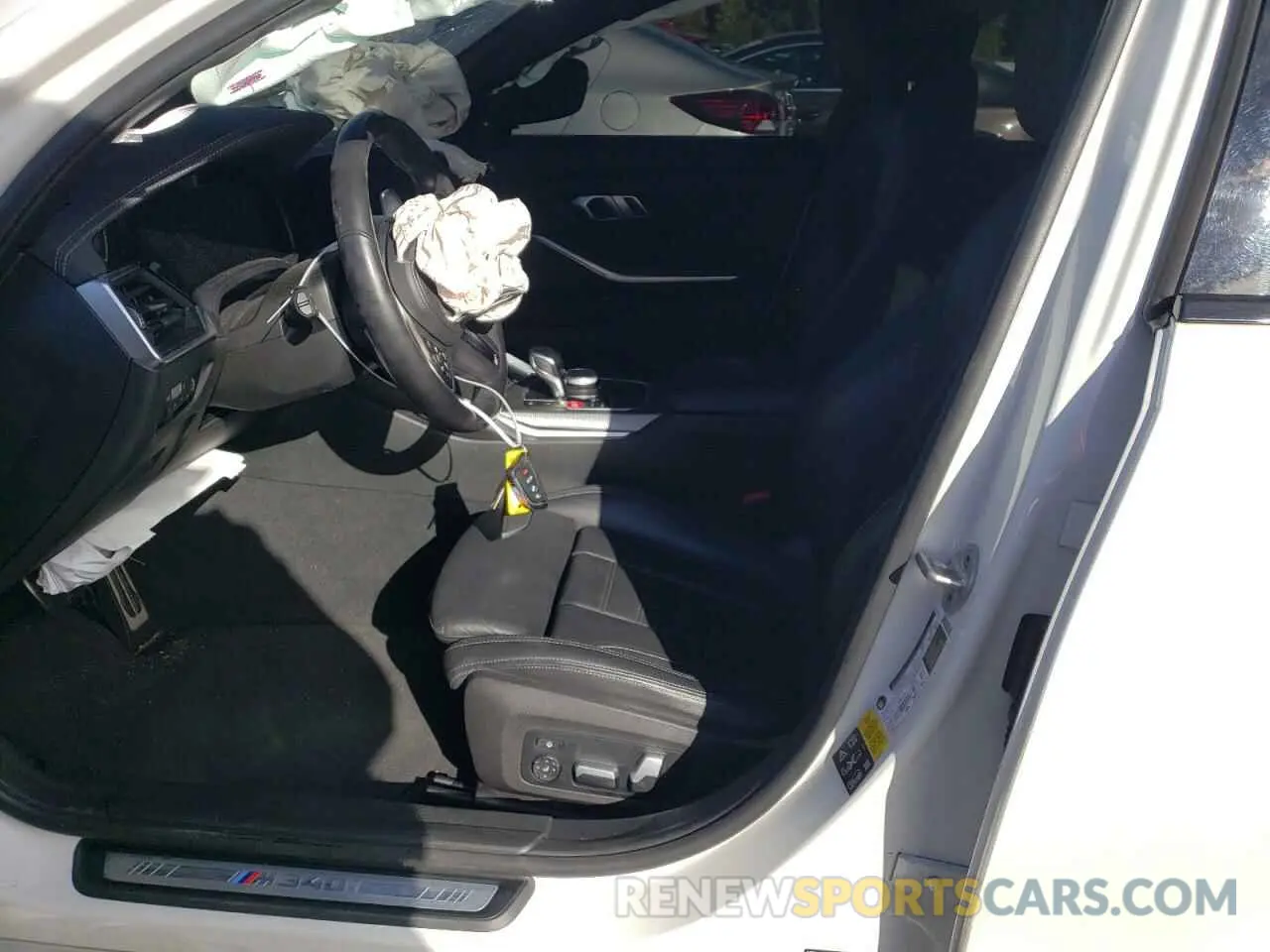 7 Photograph of a damaged car 3MW5U9J06M8B98329 BMW M3 2021