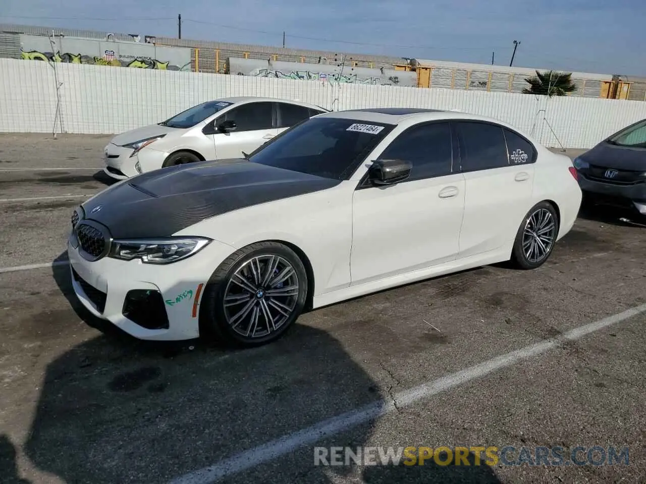 1 Photograph of a damaged car 3MW5U9J07M8B57210 BMW M3 2021