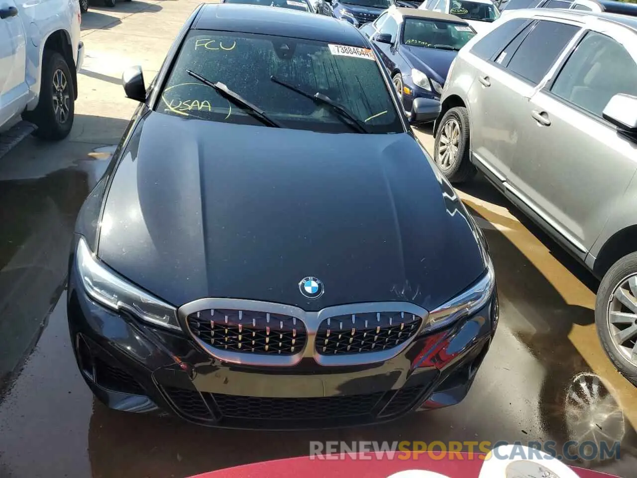 5 Photograph of a damaged car 3MW5U9J08M8B97246 BMW M3 2021