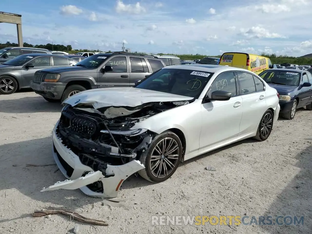 1 Photograph of a damaged car 3MW5U7J02N8C32773 BMW M3 2022