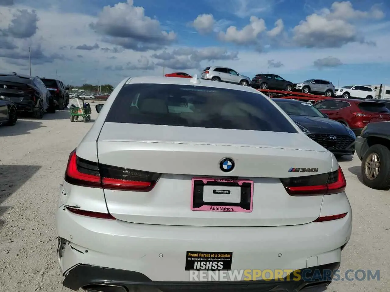 6 Photograph of a damaged car 3MW5U7J02N8C32773 BMW M3 2022