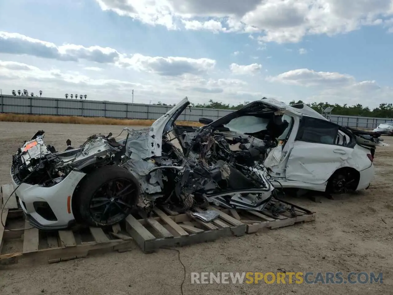 1 Photograph of a damaged car 3MW5U7J03N8C34225 BMW M3 2022