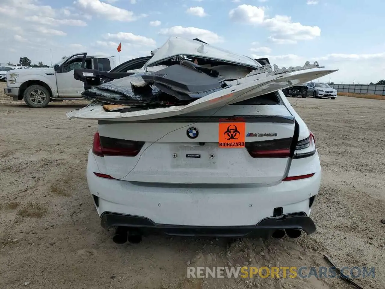 6 Photograph of a damaged car 3MW5U7J03N8C34225 BMW M3 2022