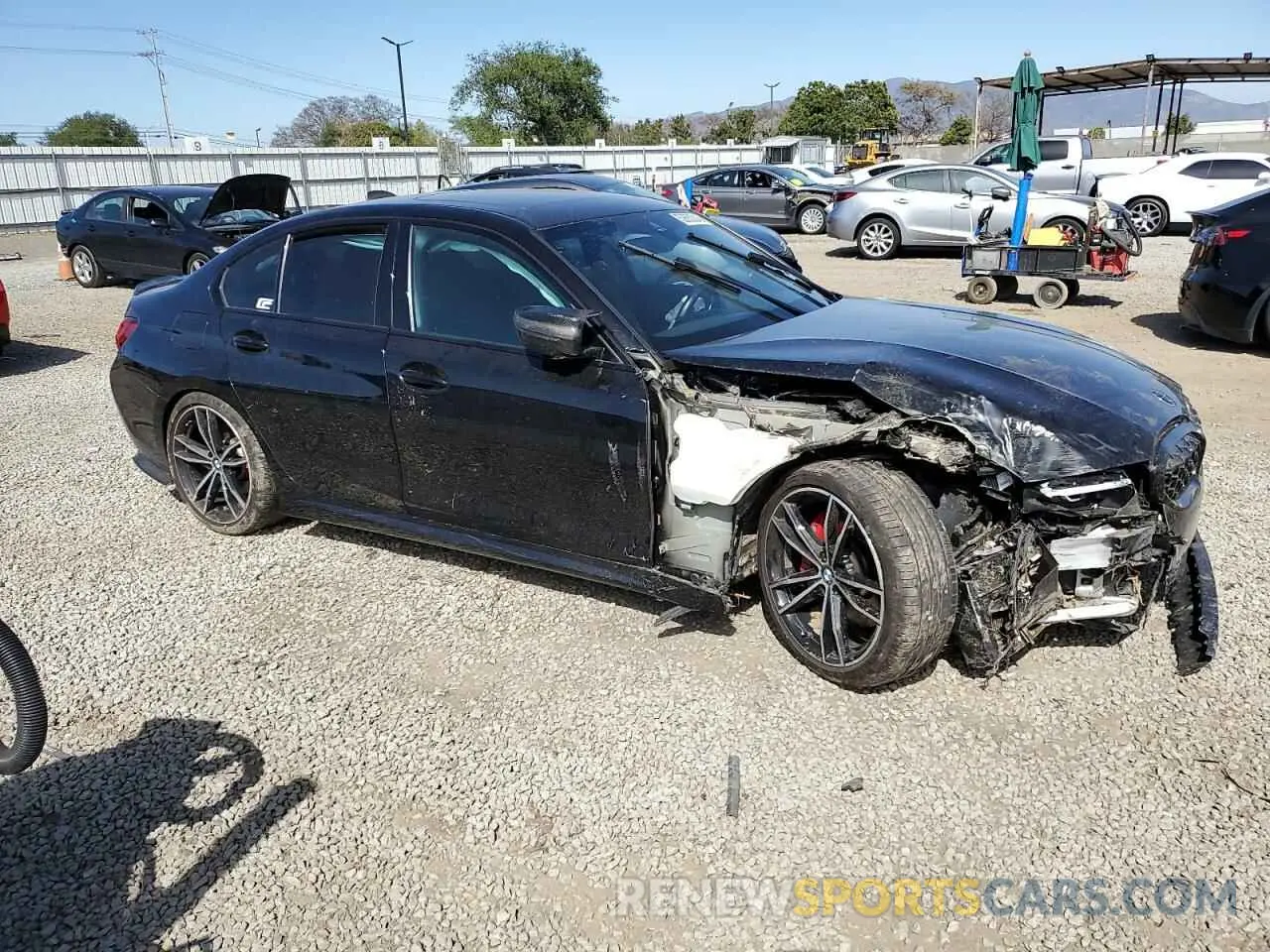 4 Photograph of a damaged car 3MW5U7J03N8C60646 BMW M3 2022