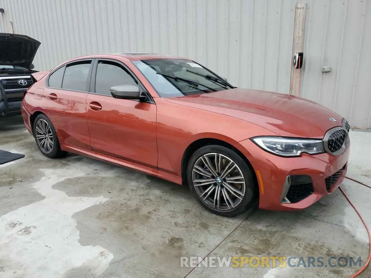 4 Photograph of a damaged car 3MW5U7J04N8C25002 BMW M3 2022