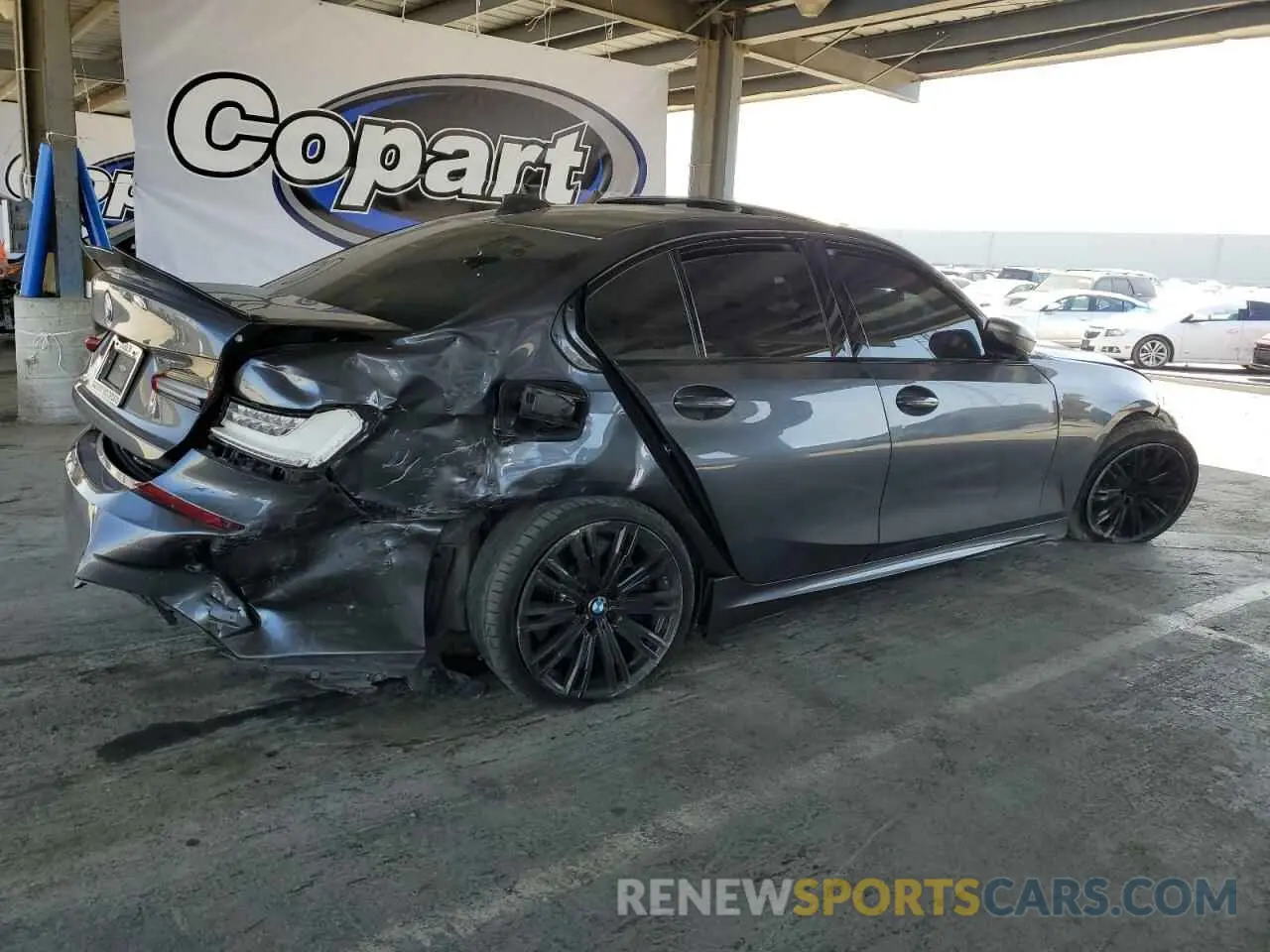3 Photograph of a damaged car 3MW5U7J04N8C39899 BMW M3 2022