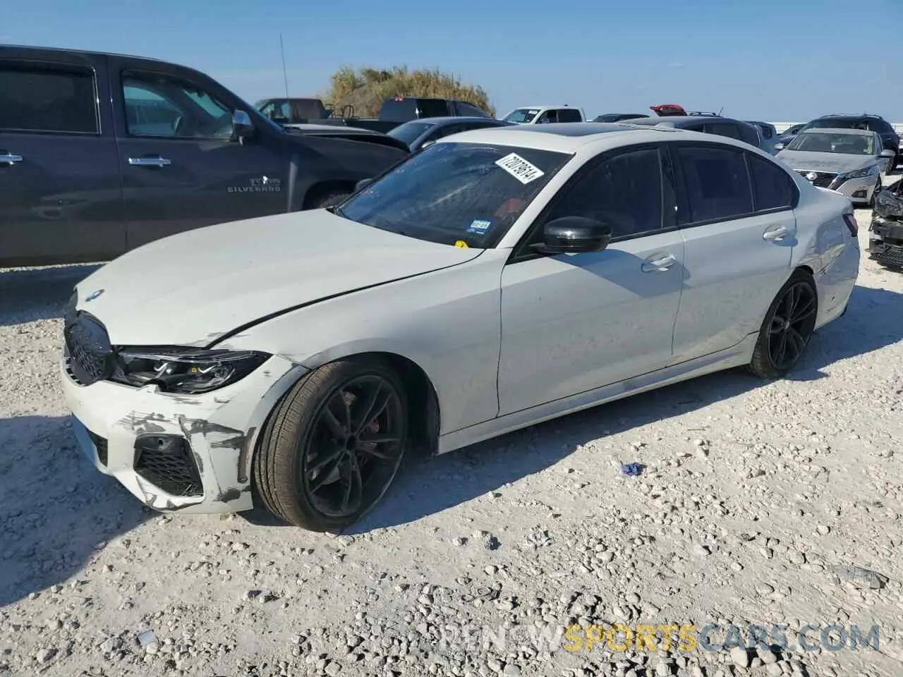 1 Photograph of a damaged car 3MW5U7J05N8C41421 BMW M3 2022