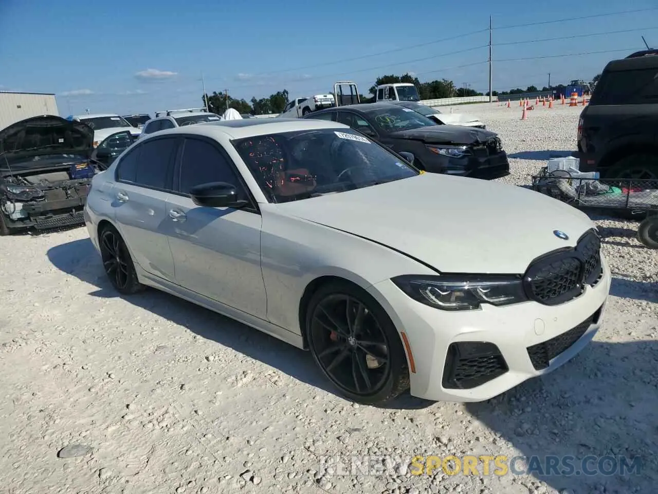 4 Photograph of a damaged car 3MW5U7J05N8C41421 BMW M3 2022